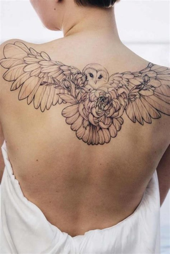 Unveiling The Enchanting Canvas Of Upper Back Tattoos For Women